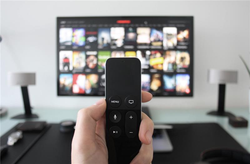 remote in front of a tv