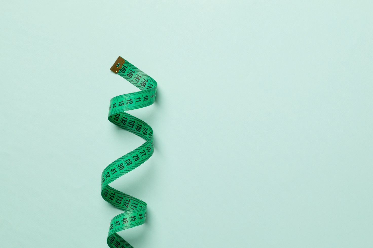 retail media measurement - green measuring tape